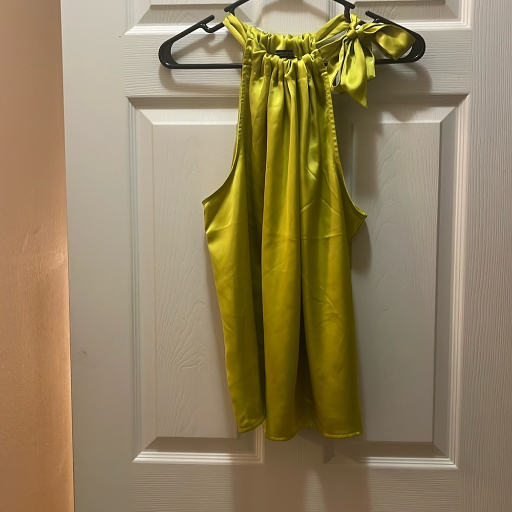 I’m selling a small sleeveless top, nice to wear with all different styles.
